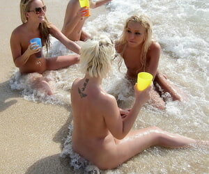 Seductive amateur lesbians taking off their bikinis and having fun outdoor