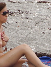 Dark hair infant Krystal Banks gains sneak-peaked by a lookie freak on the beach