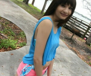 Latina babe Jessi Grey dose self shots of her tiny knockers outdoor