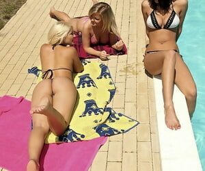 Smoking hot ladies take bikinis glorious their tits hard by the pool