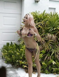 Outdoor voyeur session features big tits babe in bikini Bianca B