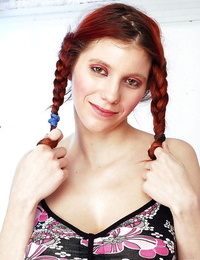 Redhead european hotty with pigtails uncovering her meatballs and bald love-cage