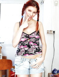 Redhead european hotty with pigtails uncovering her meatballs and bald love-cage