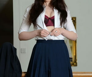 Cute schoolgirl Jessica-Ann Fegan modeling non unveil on every side nylons together with skirt