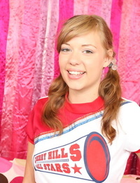 Teen cheerleader Nicole Ray shows off her perky tits and pink twat at halftime