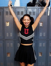 Clothed Asian MILF Coco Velvet flashing upskirt ass in cheerleader outfit