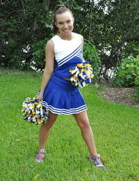 Amateur cheerleader Tiff Bannister shows off in a sexy uniform