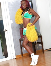 Black-skinned cheerleader Bella Cutie is dancing as was born on the web camera