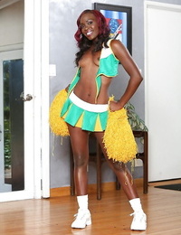 Black-skinned cheerleader Bella Cutie is dancing as was born on the web camera