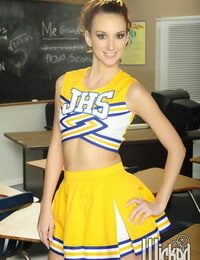 Cheerleader schoolgirl Katie Jordin amplifying muff in classroom