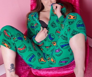 Pajama adorned babe Elouise Please baring big boobs before masturbating
