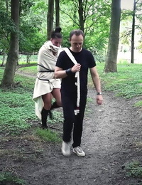 Young brunette slave is disciplined and fucked in the forest by her Master