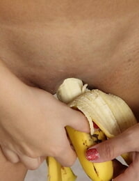 Sassy young Kira Bosworth getting unclothed and playing with banana