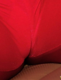 Wild ebony cutie gets undressed off red clothing and positions in insignificant white underclothing