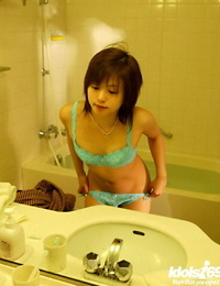 Asian babe in lingerie Hitomi Hayasaka stripping and taking bath