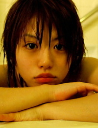 Asian babe in lingerie Hitomi Hayasaka stripping and taking bath