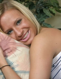 Smiley blonde in ridged jeans undressing together with fingering her shaved edit out