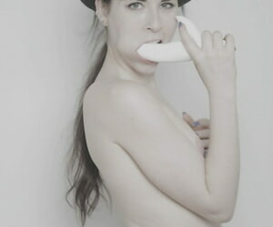 Spanish chick Amber Nevada models naked in a bowler hat before toying her twat