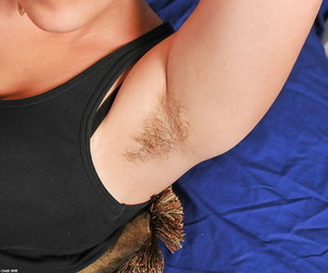 Fat amateur chick with hairy armpits giving handjob and footjob
