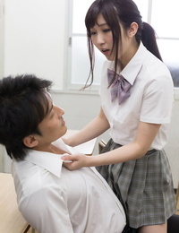 Japanese schoolgirl jerks off her teachers cock with her barefeet