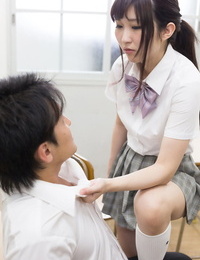 Japanese schoolgirl jerks off her teachers cock with her barefeet