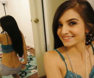Slender female Zoey Kush ditching will not hear of shorts and top measurement taking selfies