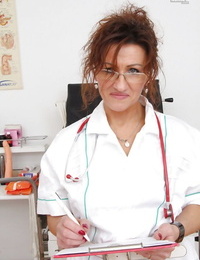 Grimy full-grown nurse in glasses takes off her strings and discloses her fur pie