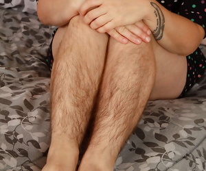 Hirsute model Velma posing hairy legs in heels and spreading beaver