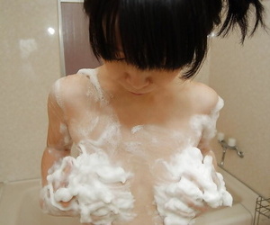 Skinny asian babe with tiny titties Yuka Kakihara taking foamy shower