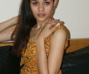 Small titted young Indian girl undressing slowly to lounge naked on her bed