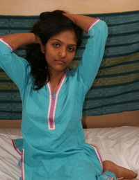 Hot Indian slut Divya removes her shirt to show her big dark nipples