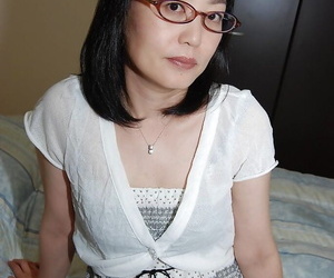 To the past asian lassie at hand glasses strips close by coupled with has some pussy vibing fun