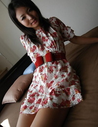 Chinese adolescent Nao Miyazaki undressing and exposing her love-cage in close up