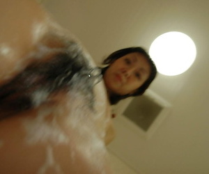 Slim asian MILF takes shower and has some pussy vibing fun
