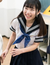 Stunning Japanese schoolgirl lifts her petticoat to play with dick for advisor in type