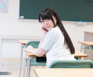 Horny Asian schoolgirl lifts up her skirt and masturbates
