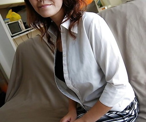 Asian gal Kimie Kuwata undressing added to exposing her belongings in close regarding