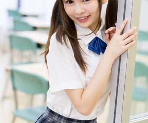 Cutie Japanese schoolgirl in pigtails shows undisguised bore in no right arm for In men\'s drawers upskirt