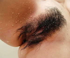Busty asian teen Ayaka Kimura taking shower and exposing her twat in close up