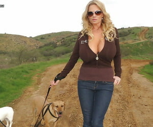 Milf amateur Kelly Madison is having a nice stroll close by her dogs