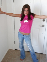 Young teen sweetie Leslie B posing in blue jeans before nude photo shoot