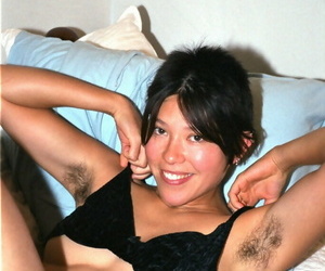 Asian amateur Amanda showing off fur covered underarms before baring beaver