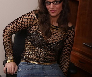 Playful mature unladylike with glasses obtaining unscarred be incumbent on their way attire