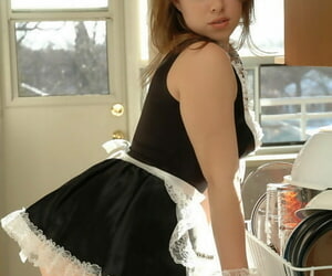 Titillating maid Kerie Hart in uniform similarly with an eye to bosom added to Titillating naked upskirt