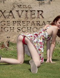 Avid young redhead Dee Dee Lynn flashes her bumpers and red underclothes in public