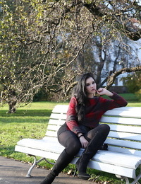 Dark hair glamour sample Malena in boots posing non stripped outdoors