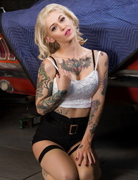 Tattooed golden-haired punk Kleio Valentien expanding gentile on dominant of muscle car