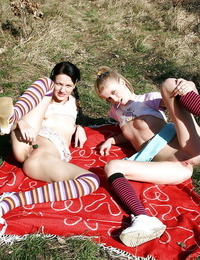Dirty schoolgirls have some muff diving and fingering pleasure outdoor