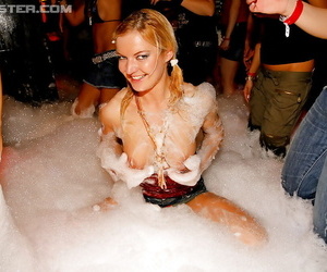 Adorable babes and horny guys are into hardcore foam sex party