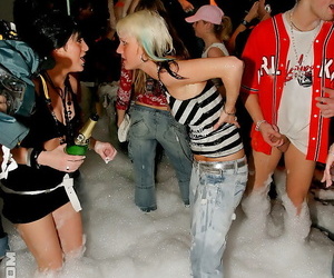 Adorable babes and horny guys are into hardcore foam sex party